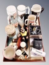 A colleciton of Breweriana including Guinness branded mugs and glasses, pair of pine cufflinks,