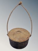 A 19th century cast iron cooking pot