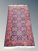 A Feraghan rug 156 cm x 73 cm