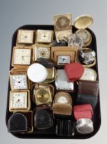 A collection of travel clocks