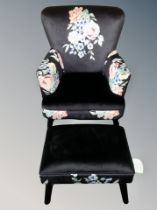 An armchair and footstool in floral fabric