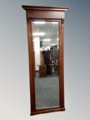 A 19th century walnut floor standing mirror,