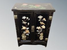 A Japanese hardstone inlaid low cabinet,