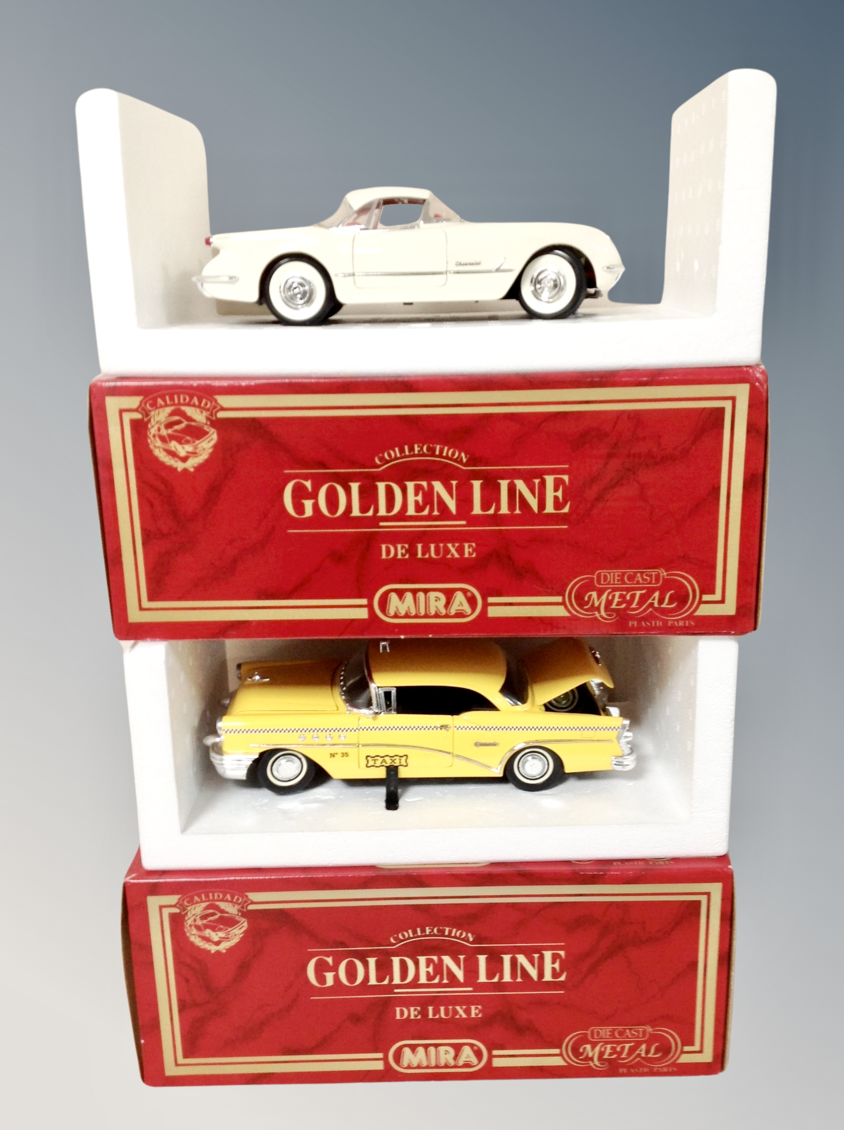 Two Mira die cast boxed vehicles - Chevrolet and New York taxi