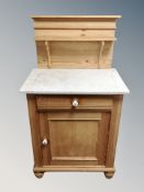 A 19th century pine marble topped washstand,