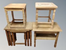 A blond oak nest of three tables and three further tables