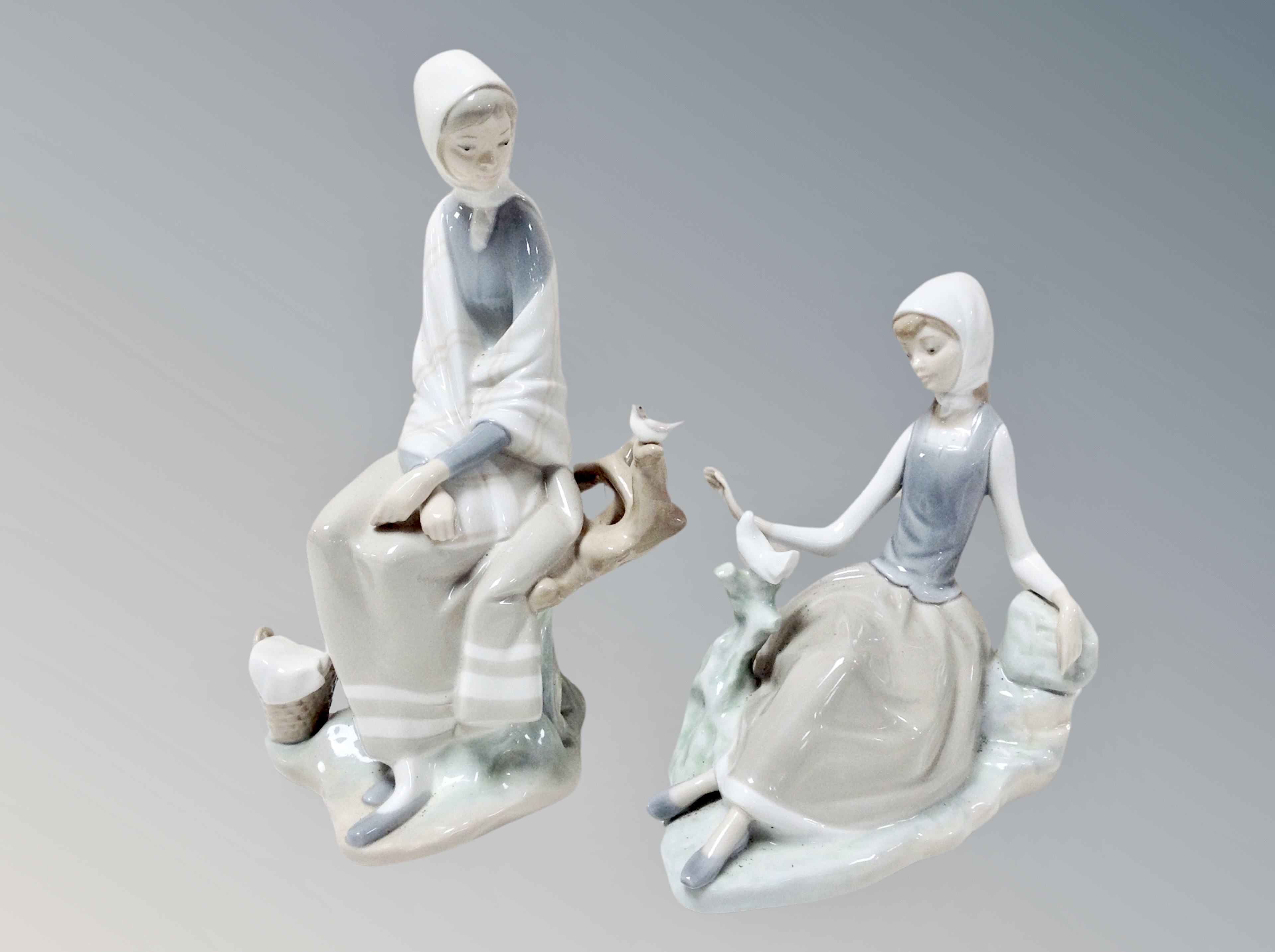 A Lladro figure of a lady carrying a goose, - Image 2 of 2