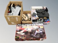 A Scalextric F1 Superteams set and two further boxes containing track,
