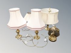 A pair of contemporary glass table lamps and three further examples