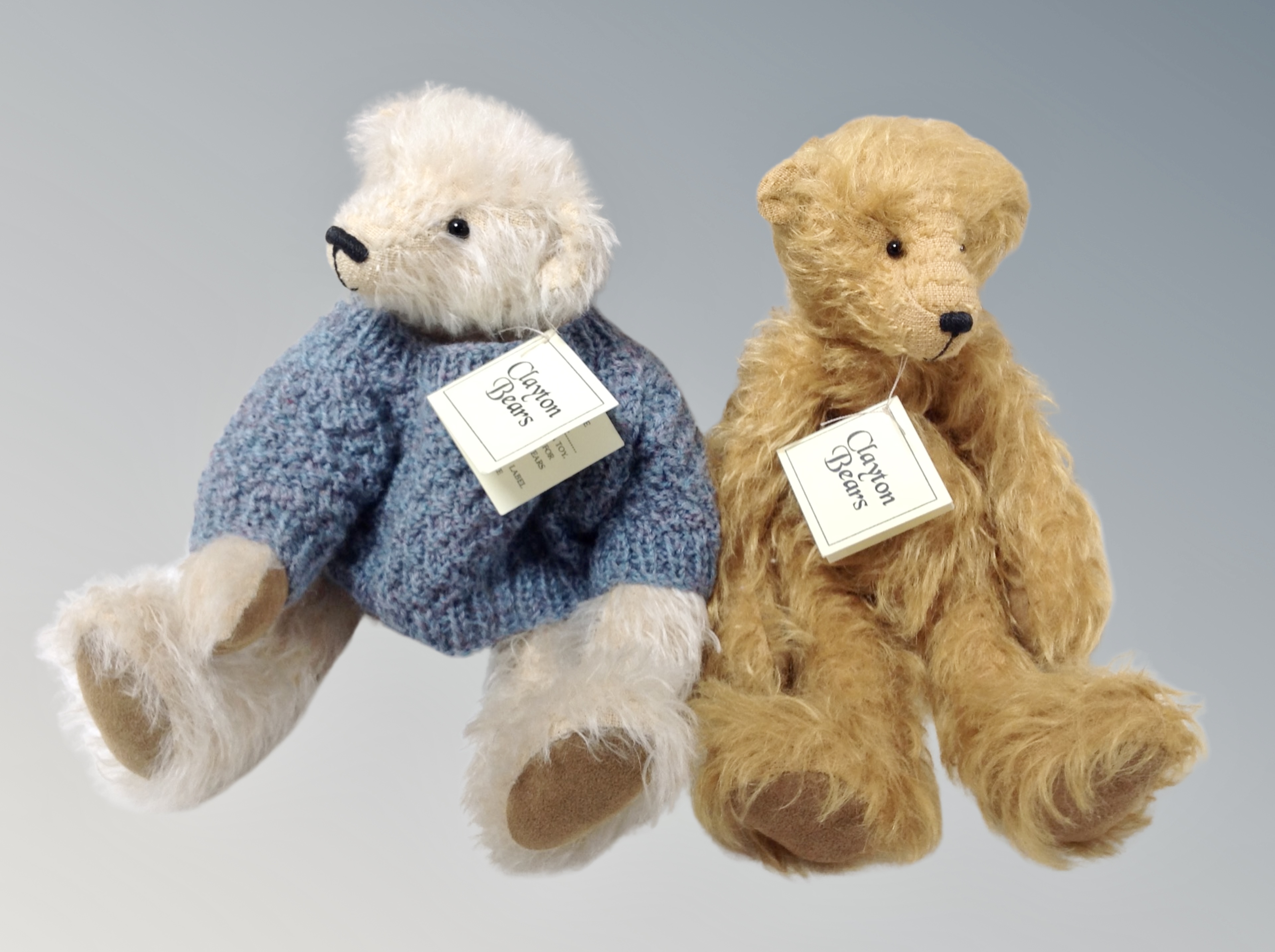 Two Clayton bears - Rufus and Ernie with tags