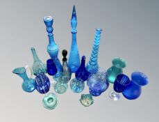 A quantity of blue glass ware including decanters,