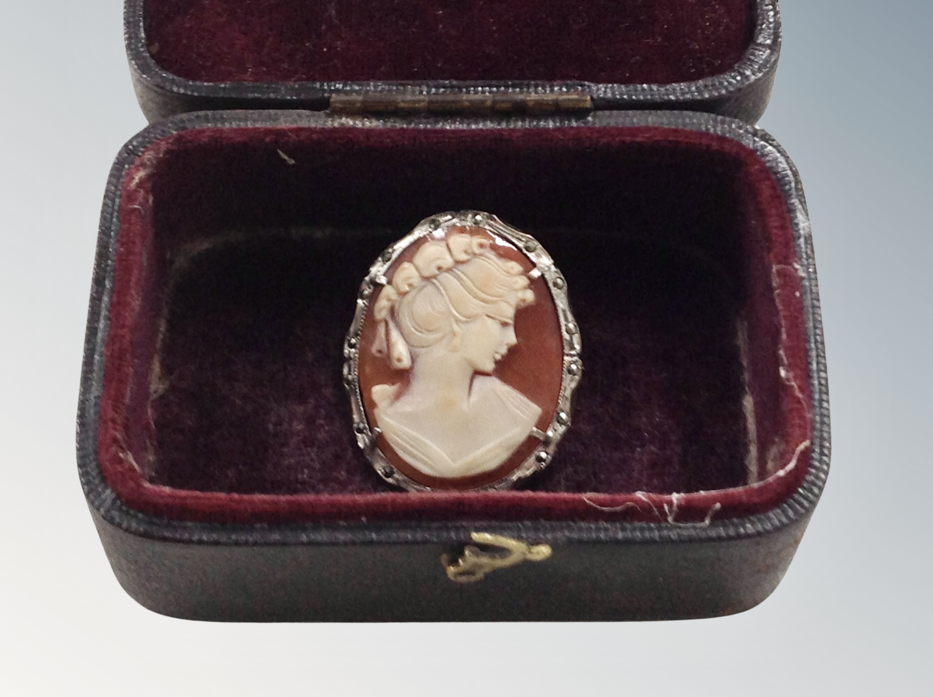 A silver and marcasite cameo brooch