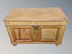 A carved oak brass mounted coffer,