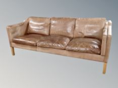 A Danish three seater tan leather three seater settee (af)