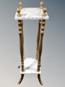 A marble and gilt wood plant stand,