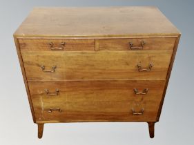 A Danish teak chest of five drawers,