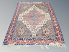 An Iranian flatweave rug 255 cm x 174 cm