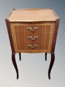 A French style teak bedside table