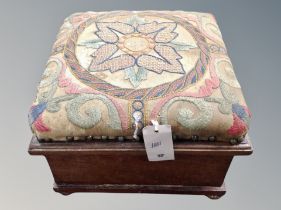 A child's commode stool with embroidered top