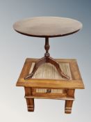 A contemporary lamp table with bamboo top together with a tripod table