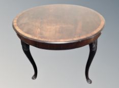 A 19th century rosewood veneered dining table