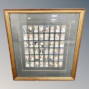 Fifty film star cigarette cards in frame
