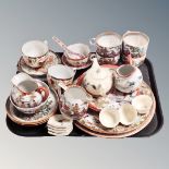 A tray of antique and later oriental tea ware