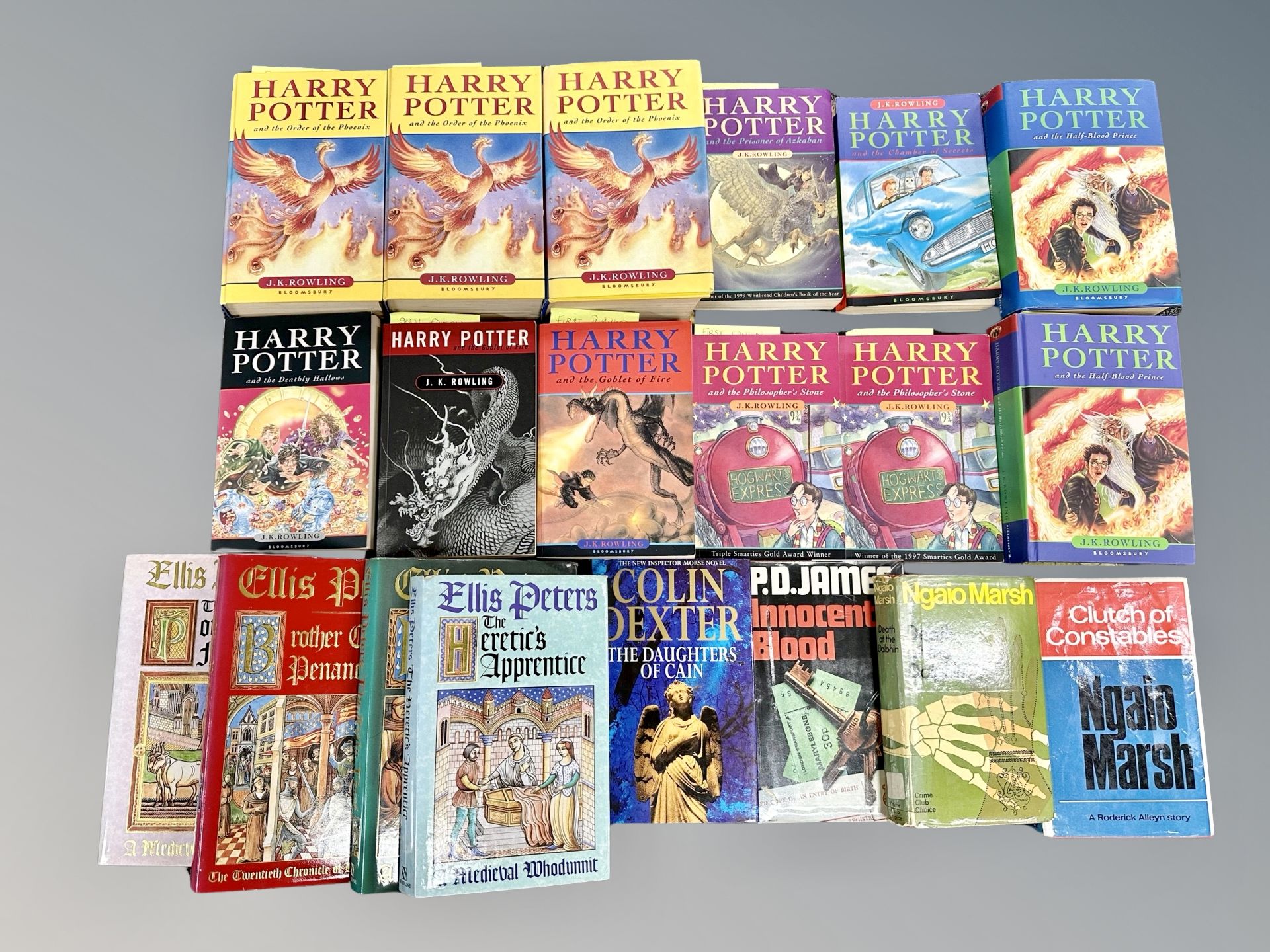 Twelve various Harry Pottery books including first editions and eight further volumes