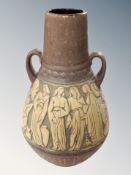 A West German twin handled pottery vase,