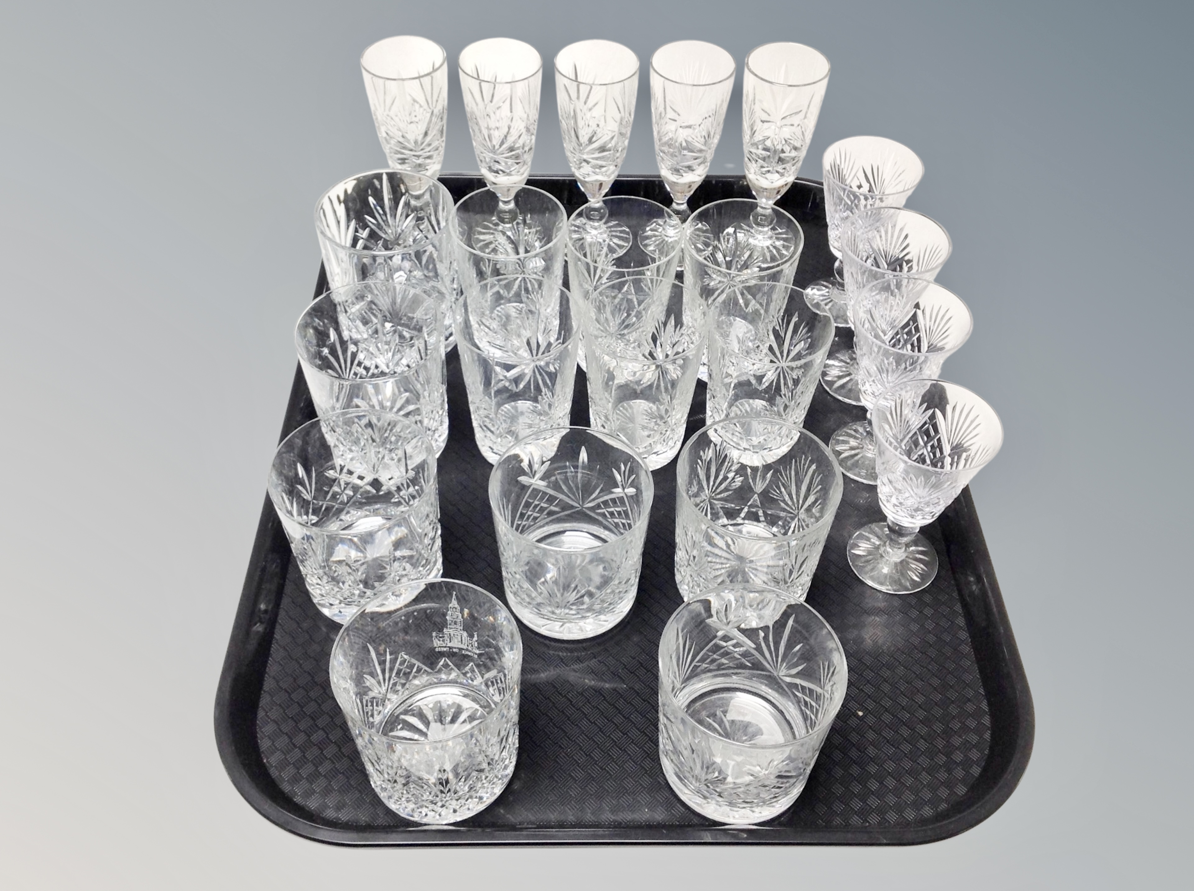 A group of Whisky tumblers and wine glasses,