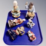 A group of six oriental porcelain figures