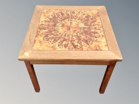 A Danish teak tiled square coffee table together with further rectangular coffee table