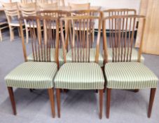 A set of six Danish spindle backed dining chairs