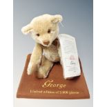 A Steiff limited edition bear - George, 597/2000, with protective bag and certificate.