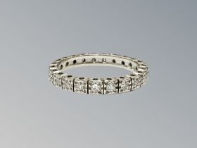 A 14ct white gold diamond full eternity ring, size M, 2.5g.