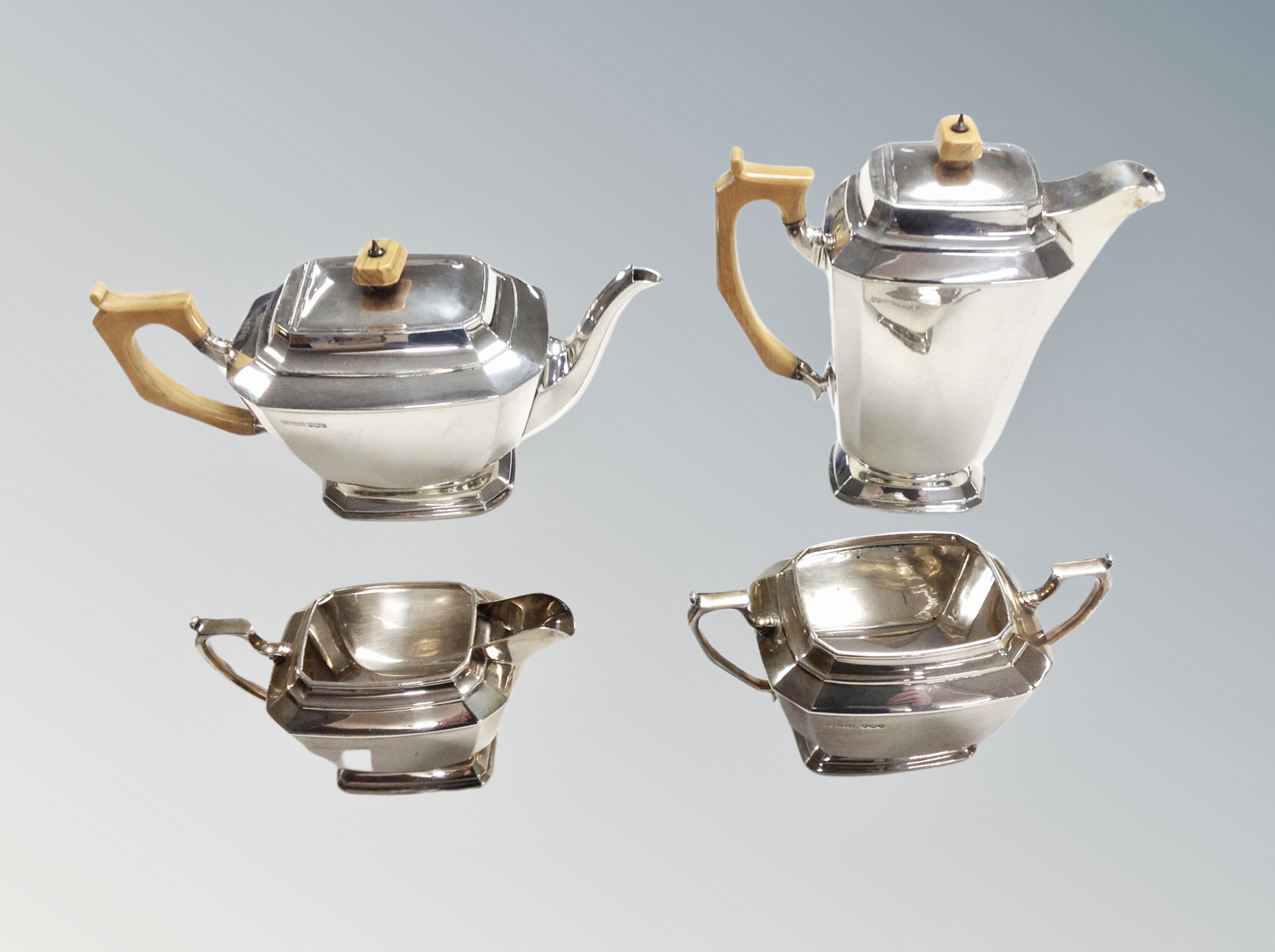 An Art Deco silver four piece tea service, Joseph Rodgers and Sons,