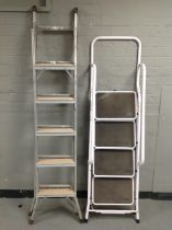 An aluminium step ladder and four tread folding ladder