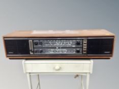 An Eltra 1025 teak cased stereo together with a pair of teak cased speakers (Continental wiring)