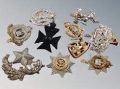 Eleven army cap badges