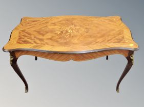 A French Kingwood veneered and marquetry coffee table,