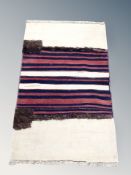 An Afghan flatweave rug 147 cm x 87 cm