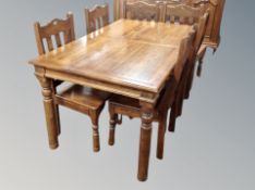 A stained pine dining table,