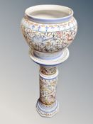 A faience pottery jardiniere on stand,