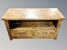 A contemporary oak two drawer entertainment stand width 115 cm