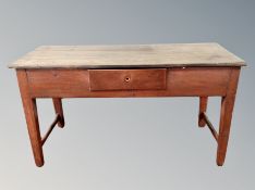 A 19th century pine kitchen table fitted a drawer,