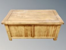 A contemporary oak blanket chest,