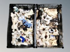 Two crates of ceramic poodle ornaments