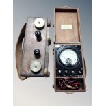 An Admiralty pattern 5526A volt meter together with one other