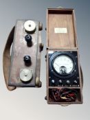 An Admiralty pattern 5526A volt meter together with one other