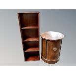 A reproduction mahogany revolving bookcase together with cylindrical cabinet